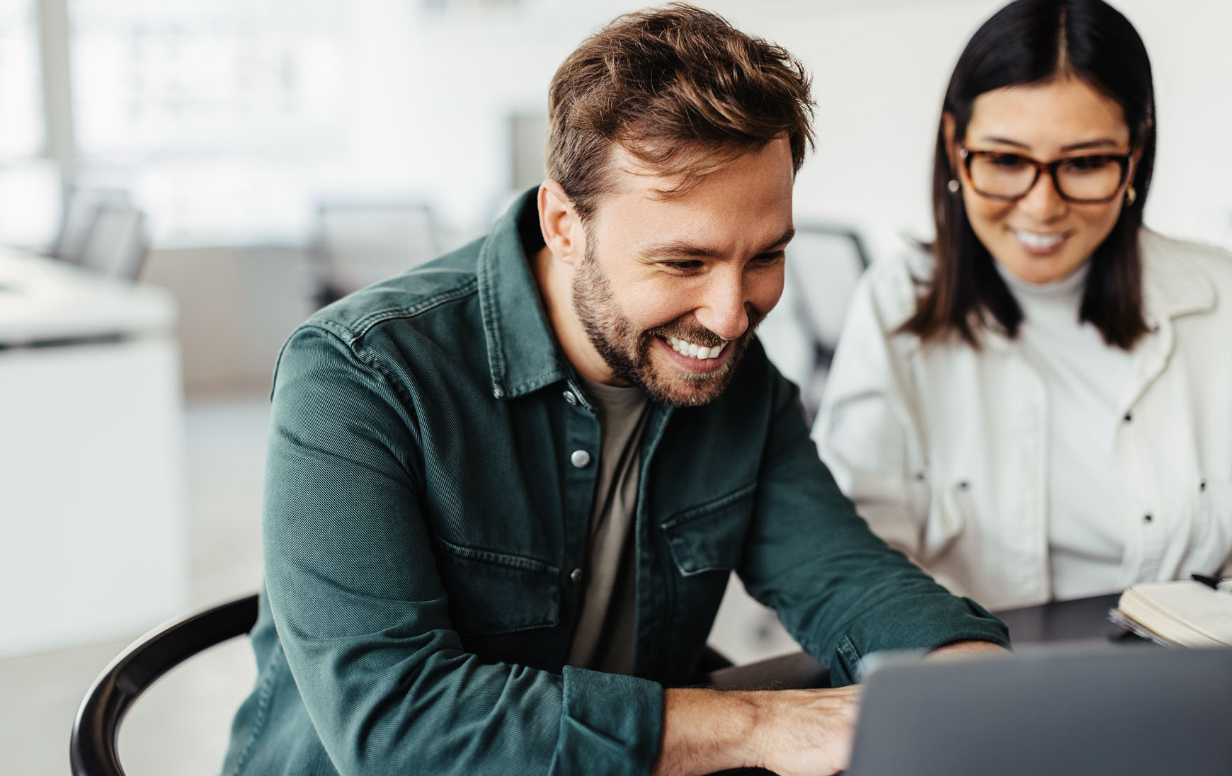 A woman and man co-create together